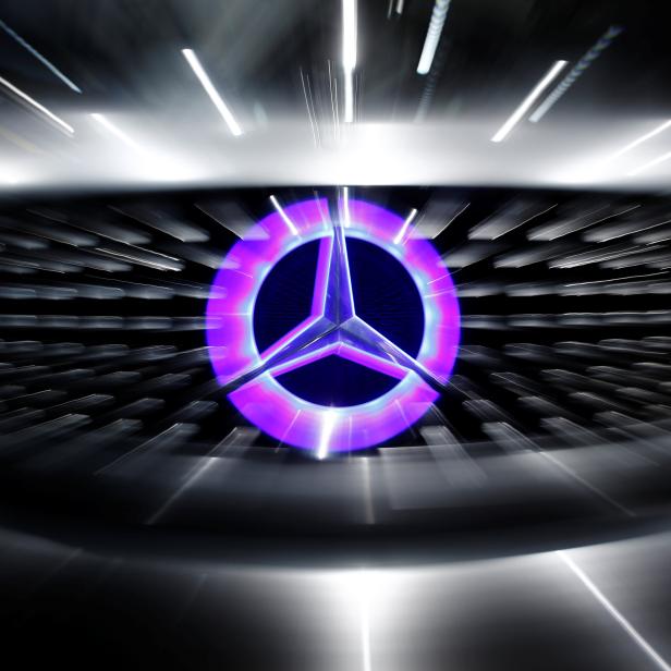 An illuminated logo of Mercedes is seen on the Mercedes-Benz F105 at an exhibition before the Daimler annual shareholder meeting in Berlin