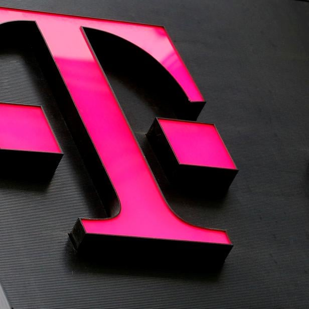 FILE PHOTO: The logo of T-Mobile Austria is seen outside of one of its shops in Vienna