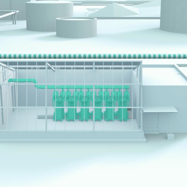 Eine Anlage mit Rohren und Maschinen in einem Gebäude.