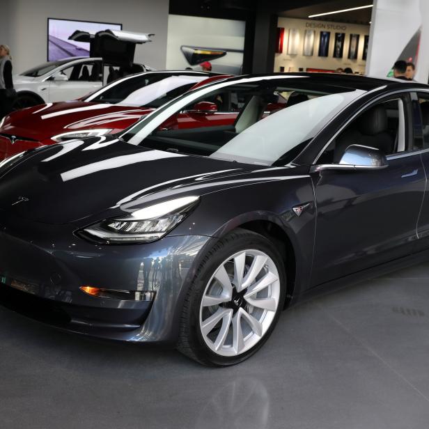 FILE PHOTO:    A Tesla Model 3 is seen in a showroom in Los Angeles