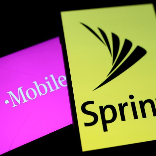 FILE PHOTO:    Smartphones with the logos of T-Mobile and Sprint are seen in this illustration