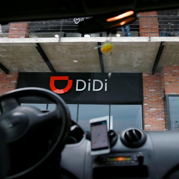 The logo of Chinese ride-hailing firm Didi Chuxing is seen at their new drivers center in Toluca