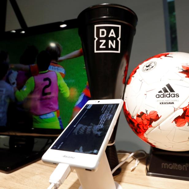 DAZN live sports streaming service is seen on a moble phone at NTT Docomo's flagship shop in Tokyo