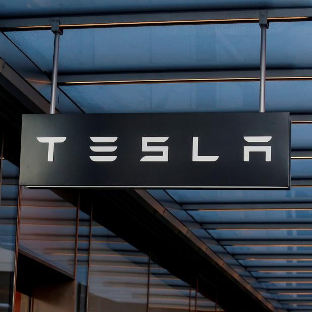 FILE PHOTO:  A sign is seen outside Tesla Motors' new showroom in Manhattan's Meatpacking District in New York City