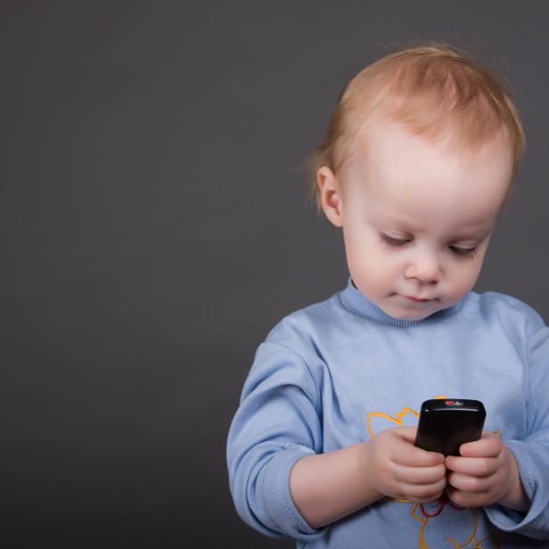 baby with cell phone