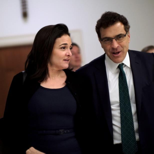 Facebook Chief Operating Officer Sheryl Sandberg and Vice President of global communications and public policy Elliot Schrage on Capitol Hill after meeting with U.S. Rep. Jackie Speier (D-CA) in Washington