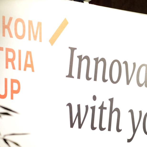 Das Logo der Telekom Austria Group mit dem Slogan „Innovating with you“.