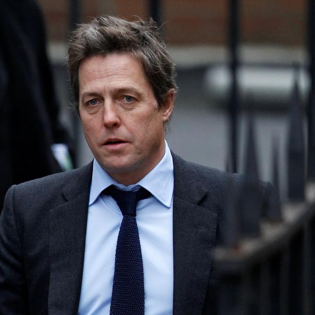 FILE PHOTO: British actor Hugh Grant arrives at the Leveson Inquiry at the High Court in central London