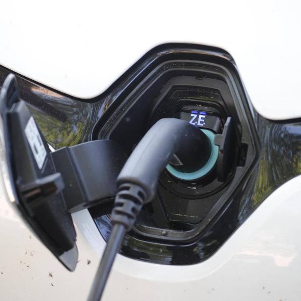 Electric car is charged at the charging station at the front of the German utility E.ON headquarters in Essen