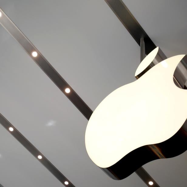 FILE PHOTO: Apple logo is pictured inside the newly opened Omotesando Apple store at a shopping district in Tokyo, Japan