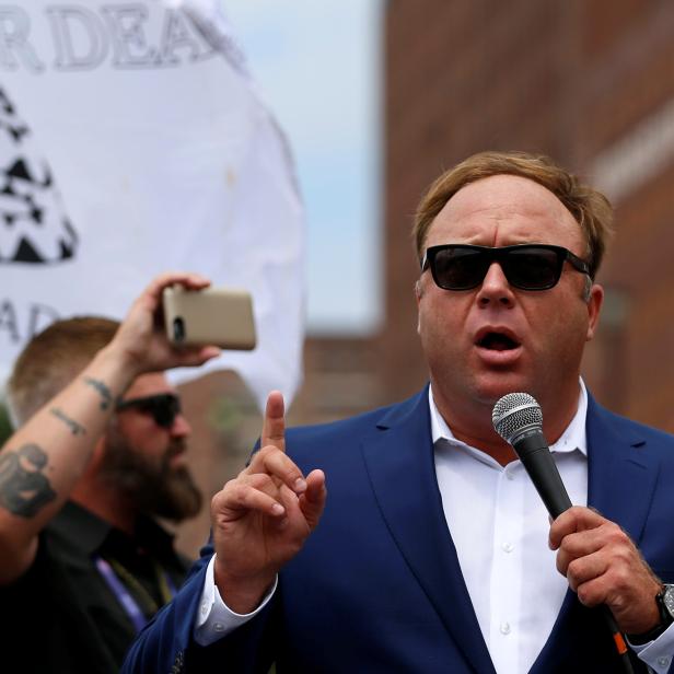 FILE PHOTO: Alex Jones from Infowars.com speaks during a rally in support of Republican presidential candidate Donald Trump near the Republican National Convention in Cleveland