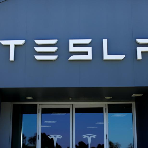 FILE PHOTO: A Tesla sales and service center in Costa Mesa California