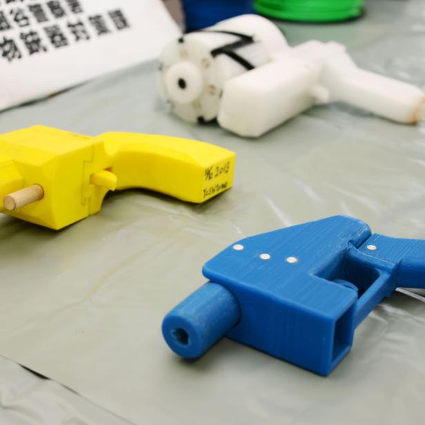 Seized plastic handguns which were created using 3D printing technology are displayed at Kanagawa police station in Yokohama, south of Tokyo