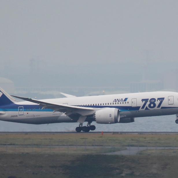 An ANA Boeing Co's 787 Dreamliner plane, which flew from Sapporo, lands at Haneda airport in Tokyo