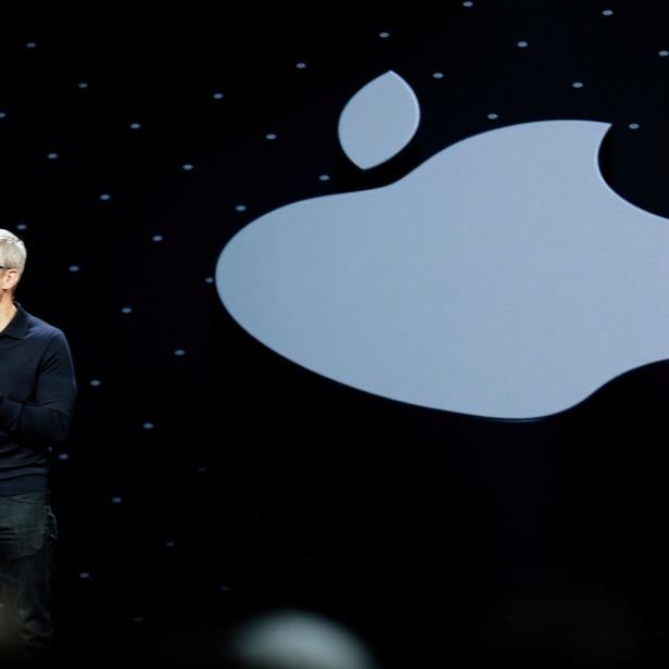 FILE PHOTO: Apple Chief Executive Officer Tim Cook speaks at the Apple Worldwide Developer conference (WWDC) in San Jose