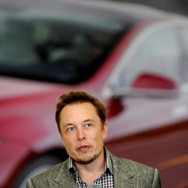 FILE PHOTO: Tesla Chief Executive Office Elon Musk speaks at his company's factory in Fremont