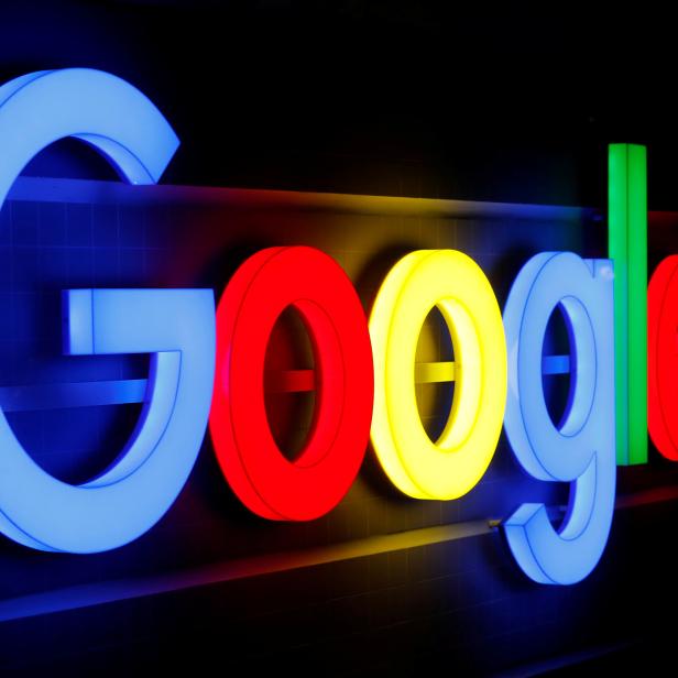 FILE PHOTO: An illuminated Google logo is seen in Zurich