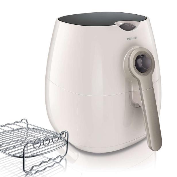 Eine weiße Philips Heißluftfritteuse mit einem dazugehörigen Grillrost.