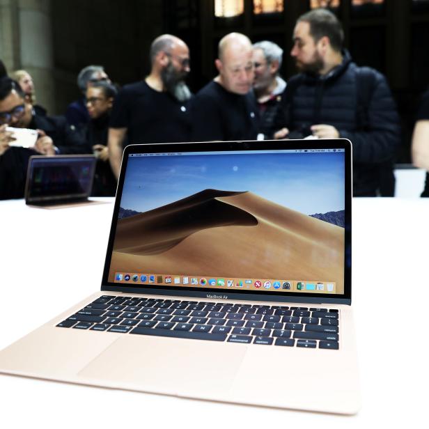 Attendees try out the new MacBook Air during an Apple launch event in the Brooklyn borough of New York