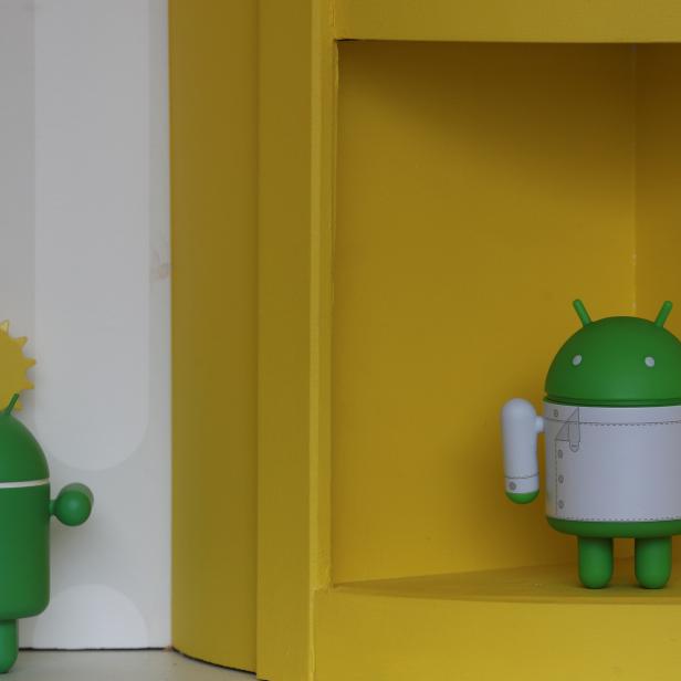 Android toys are displayed at one of its booths at the Mobile World Congress in Barcelona