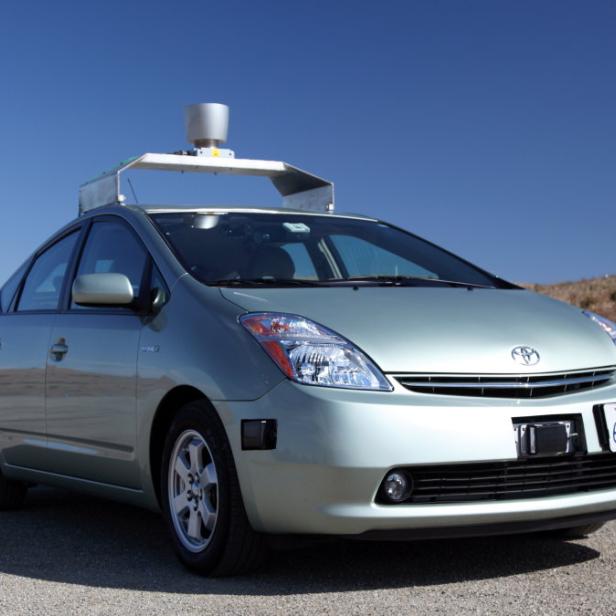 epa03211046 A Handout photograph released by Google on 08 May 2012 showing a Toyota Prius self-driving car. News reports state that Google has obtained a license in the state of Nevada, which changed its laws in March to allow self-drive cars, to operate the vehicle. EPA/GOOGLE / HO HANDOUT EDITORIAL USE ONLY/NO SALES