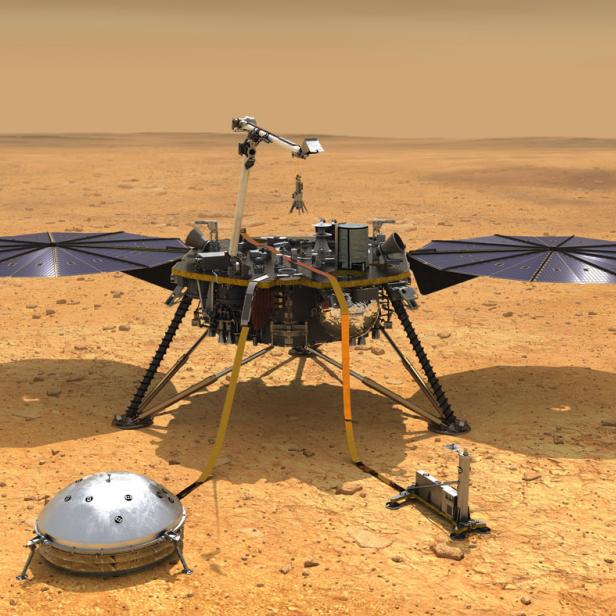 Der Mars-Lander InSight auf der Marsoberfläche mit ausgeklappten Solarpanelen.