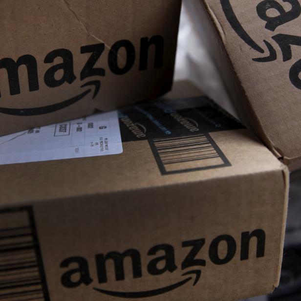 FILE PHOTO: Amazon boxes are seen stacked for delivery in the Manhattan borough of New York City