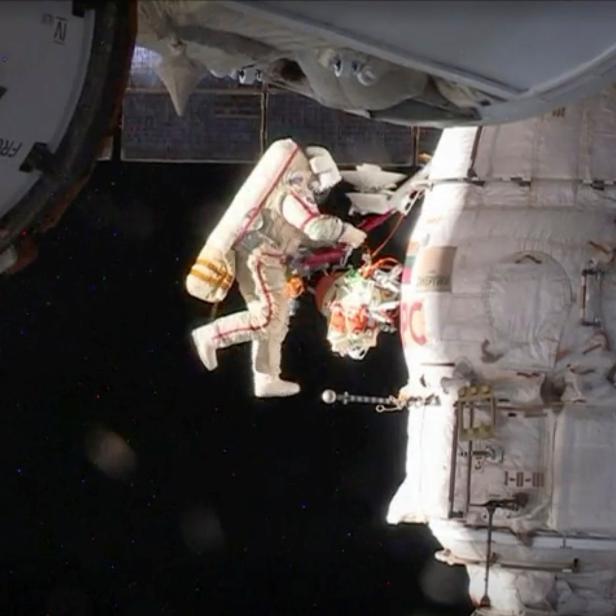 Russian cosmonaut Oleg Kononenko conducts a spacewalk outside the International Space Station Space (ISS) in this still image captured from NASA video in space