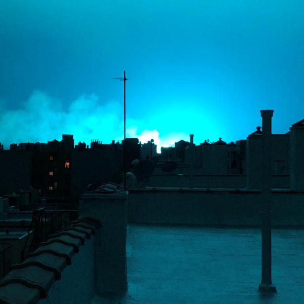 Bright blue light is seen after a transformer explosion on Thursday at an electric power station in Queens