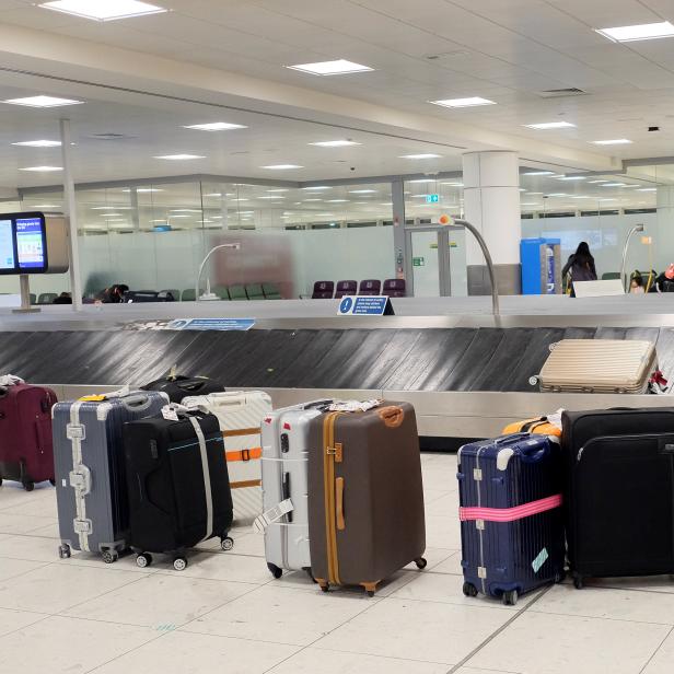 Luggage waiting to be collected by passengers is seen at London Gatwick Airport in London