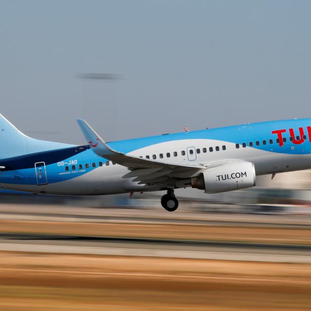 FILE PHOTO: A TUI fly Belgium Boeing 737 airplane takes off from the airport in Palma de Mallorca