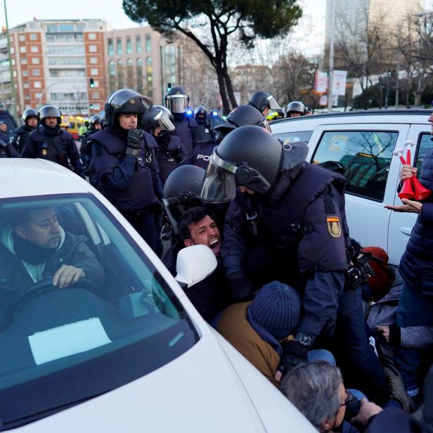 Taxi drivers disrupt traffic to protest against ride-hailing services in central Madrid