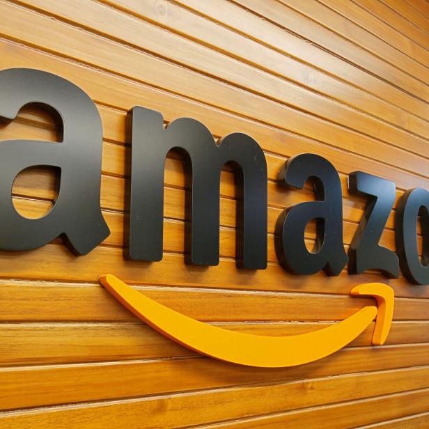 FILE PHOTO: The logo of Amazon is pictured inside the company's office in Bengaluru