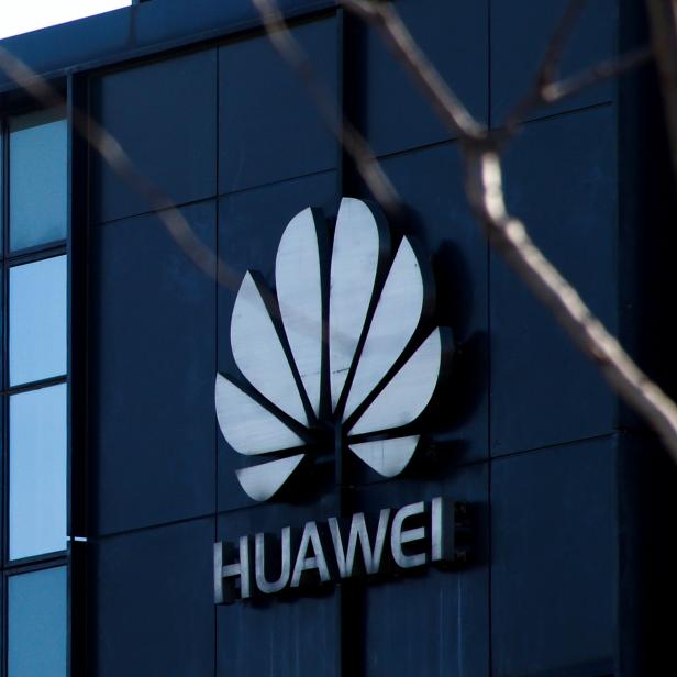 FILE PHOTO: Company logo at the office of Huawei in Beijing