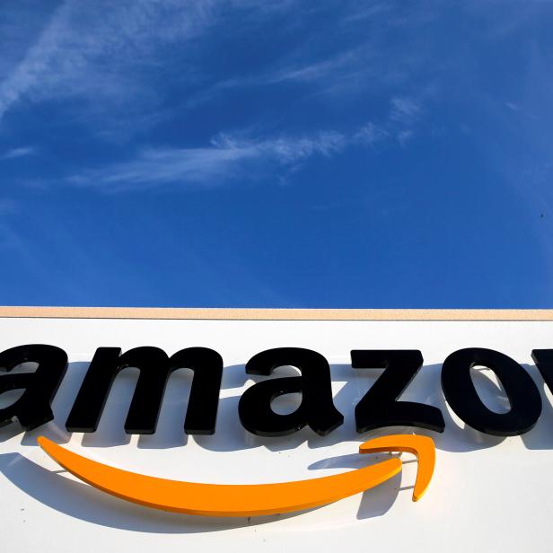 FILE PHOTO: The logo of Amazon is seen at the company logistics centre in Boves