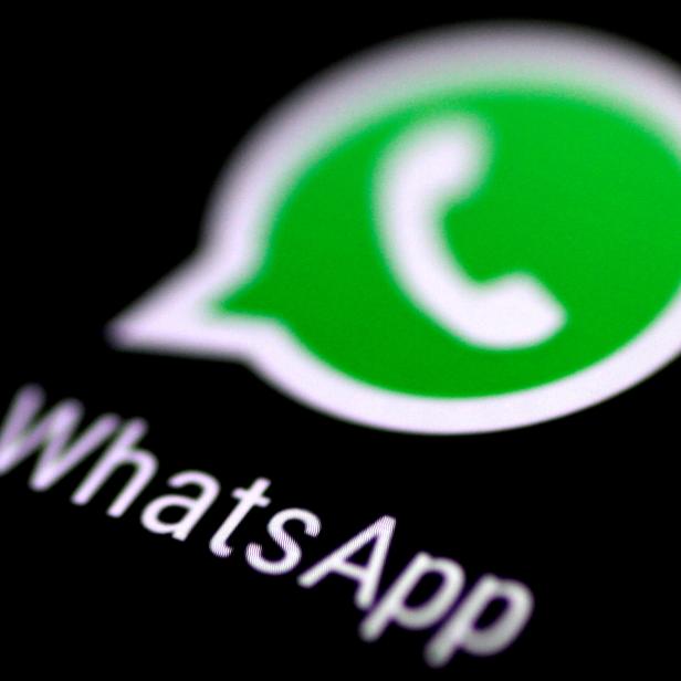 FILE PHOTO: The WhatsApp messaging application is seen on a phone screen