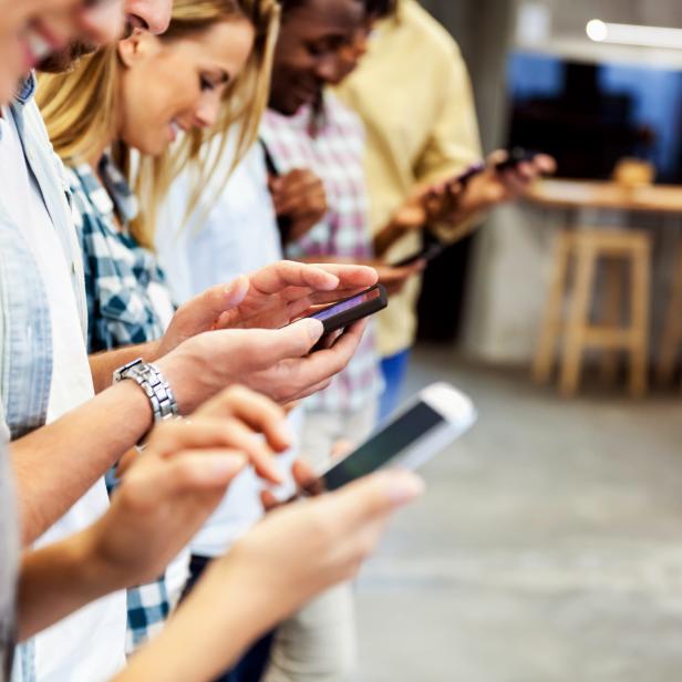 Group of people using their smart phones