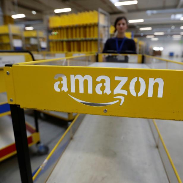 An employee works at the Amazon fulfillment center in the village of Dobroviz, near Prague