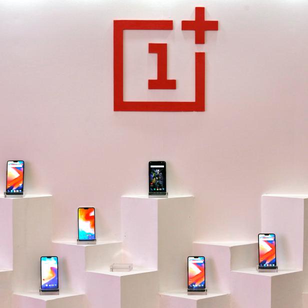 OnePlus mobile phones are seen on display during a press briefing in Mumbai