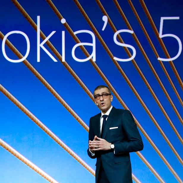 FILE PHOTO: Rajeev Suri, Nokia's President and Chief Executive Officer, speaks during the Mobile World Congress in Barcelona