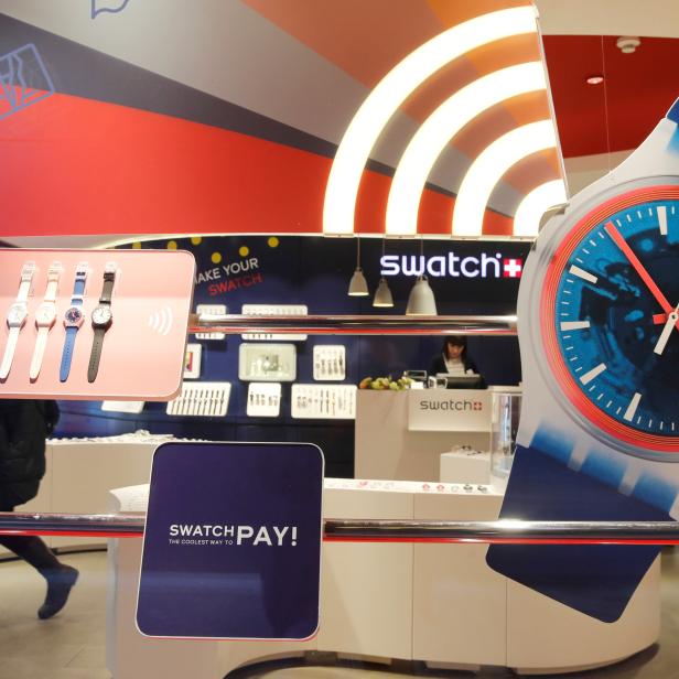 FILE PHOTO: Watches are displayed in a window of a store of Swiss manufacturer Swatch in Zurich