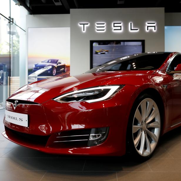 FILE PHOTO: A Tesla Model S electric car is seen at its dealership in Seoul