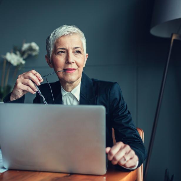 Mature Businesswoman In Her Office.