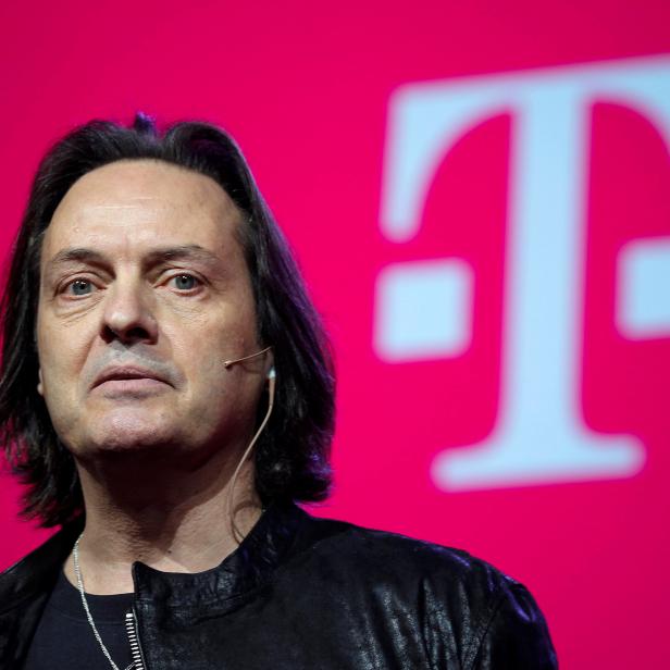 FILE PHOTO: T-Mobile CEO Legere speaks to guests during their company's Un-carrier 9.0 event in New York