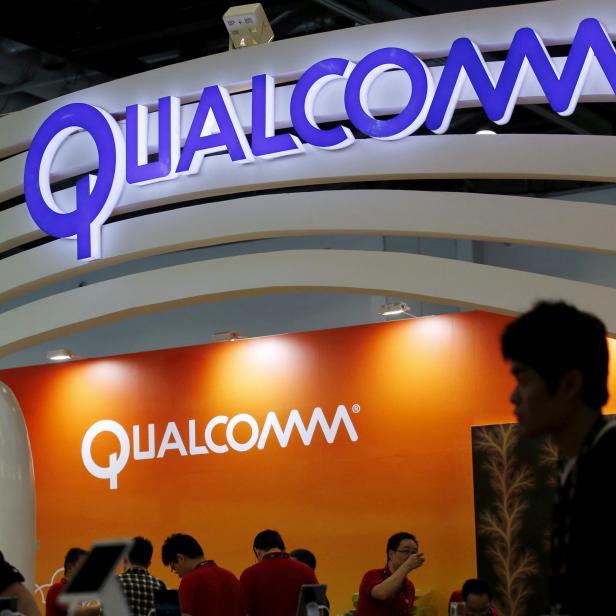 FILE PHOTO: Qualcomm's logo is seen at its booth at the Global Mobile Internet Conference (GMIC) 2015 in Beijing