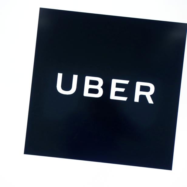 FILE PHOTO: Uber's logo is pictured at its office in Tokyo