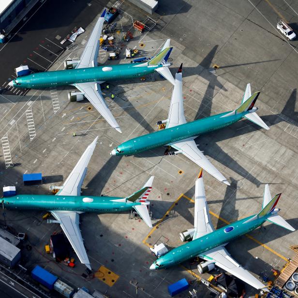 An aerial photo shows Boeing 737 MAX airplanes parked on the tarmac at the Boeing Factory in Renton