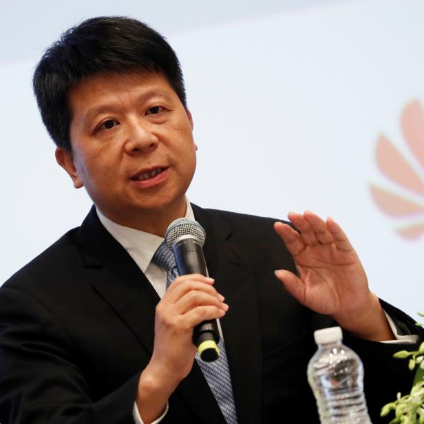 Huawei's rotating Chairman Guo Ping speaks during an news conference in Shenzhen, Guangdong province