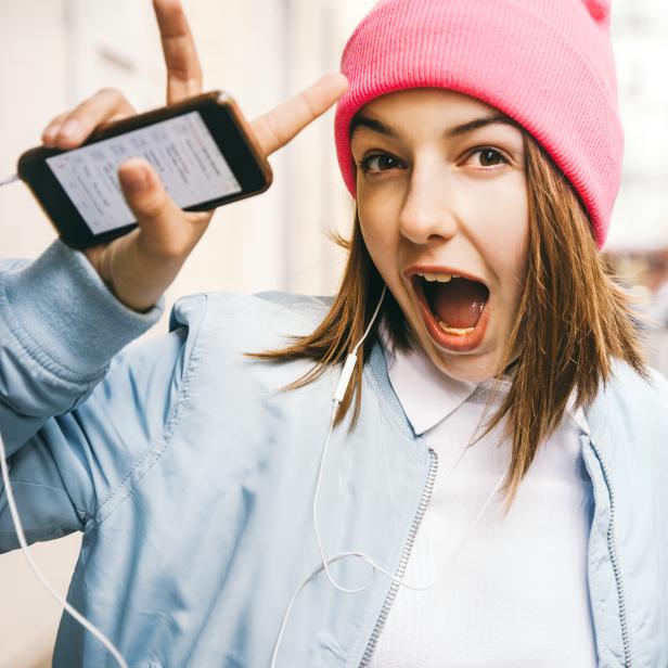 Teenager girl listening music