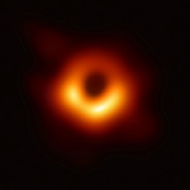 Handout of the first ever photo of a black hole, taken using a global network of telescopes, conducted by the Event Horizon Telescope (EHT) project